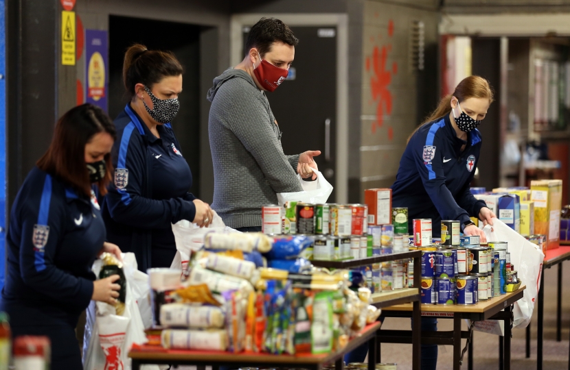 Tees Valley Mayor Ben Houchen packaging up food parcels at the Riverside Stadium in Middlesbrough today (October 26)