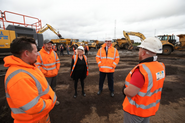 Tees Valley Mayor Ben Houchen with Mary Lanigan and workers at Teesworks